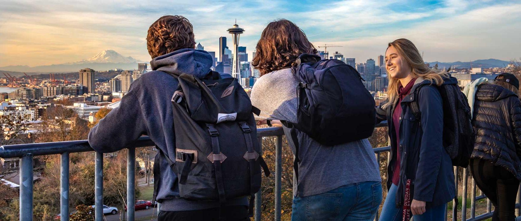 students look at view of kerry park